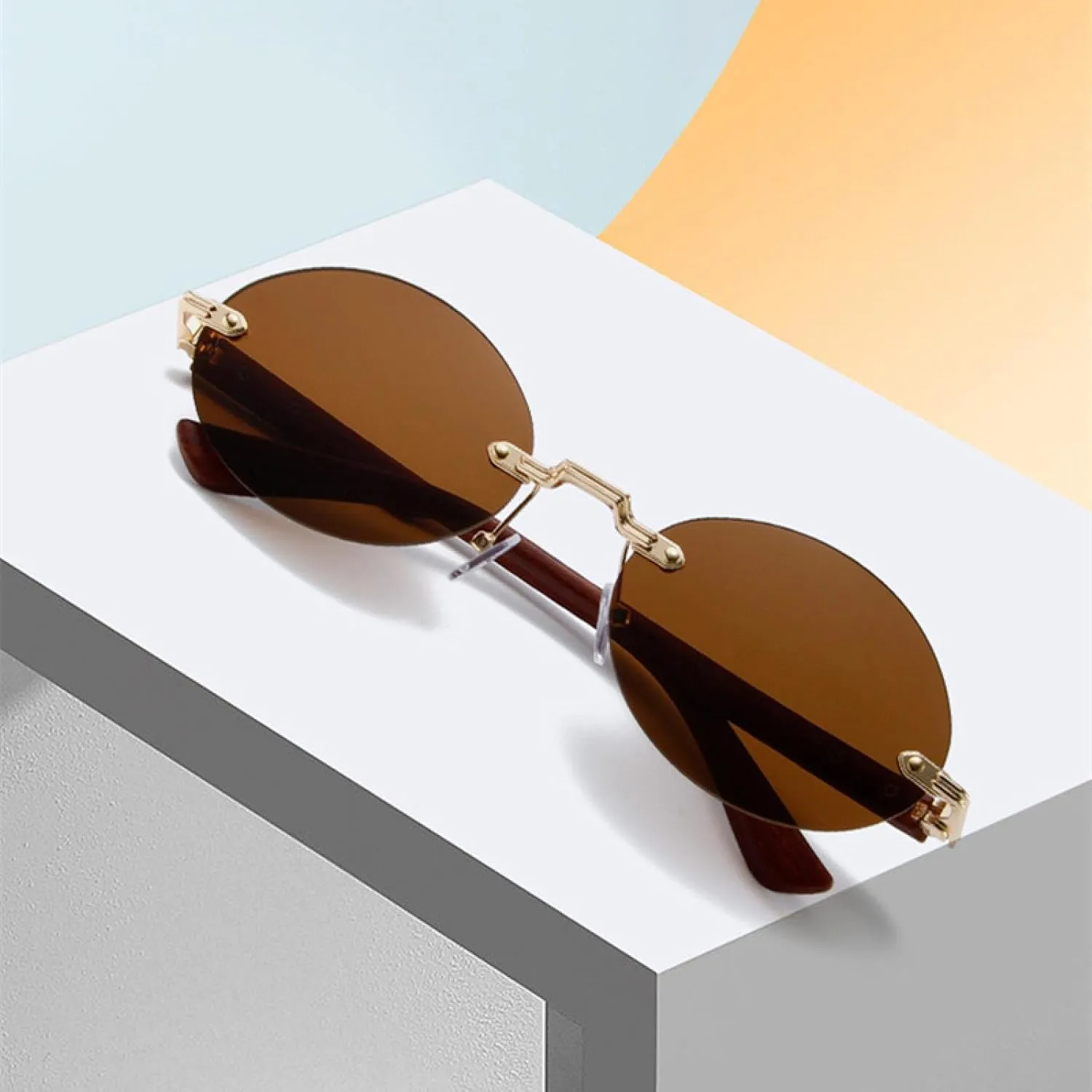 Popular Fashion Oval Sunglasses for Women Retro Rimless Clear Ocean Gradient Lens Shades Uv400 Men Punk
